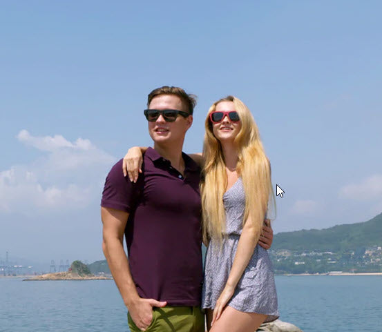 A woman and a man wearing smart sunglasses with wireless technology for calls