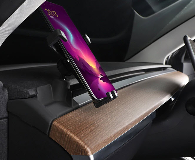 Tesla model 3 smartphone holder with a phone mounted on it