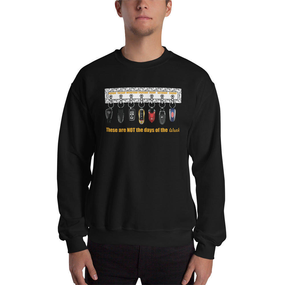 Man wearing a black crew neck sweatshirt with car keys design and the text "These are NOT the days of the Weak"