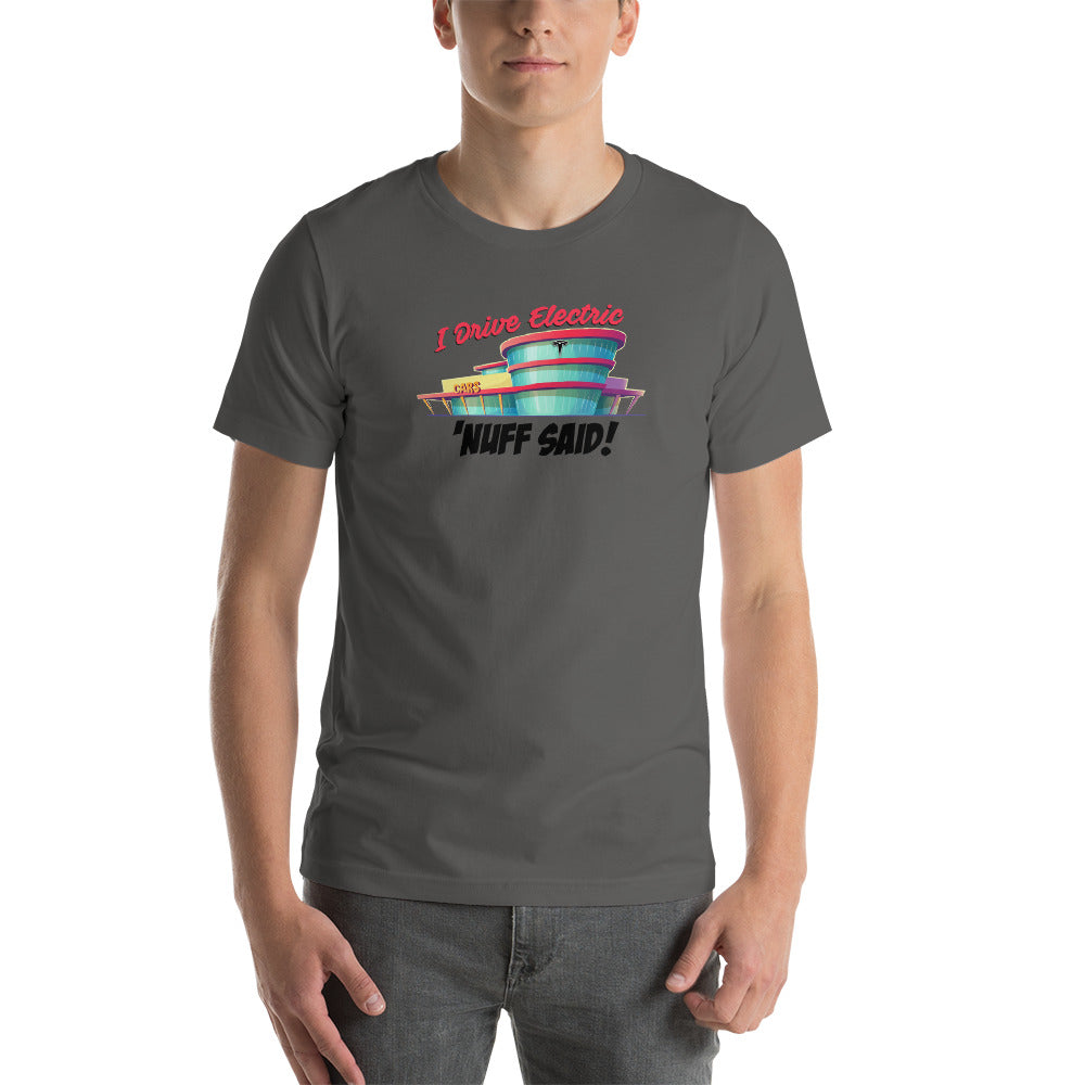 Man wearing a gray t-shirt that has a Tesla car dealership graphic design says "I Drive Electric 'NUFF SAID!"