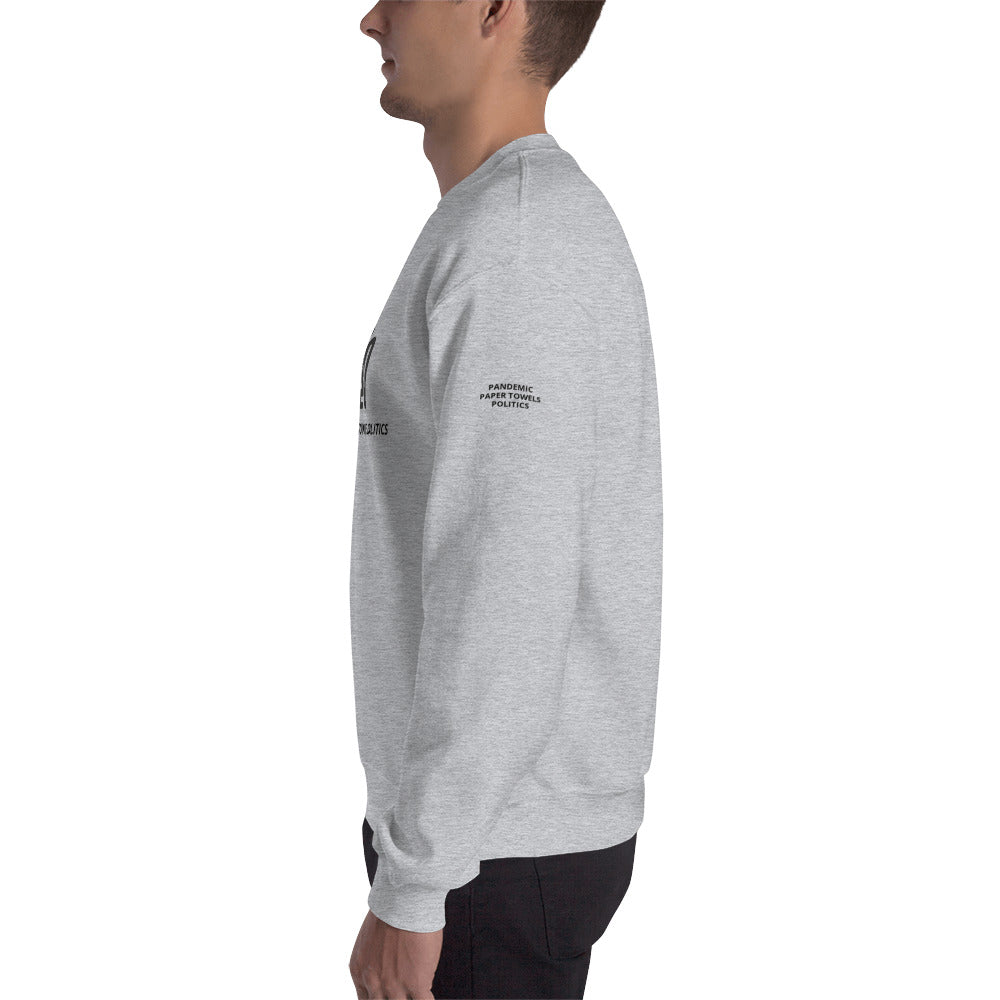 Man wearing a gray sweatshirt with the F20 design imprinted on it standing sideways