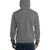 Rear view of a man wearing a gray hoodie with the letters "LSS" imprinted on the nape of the hoodie