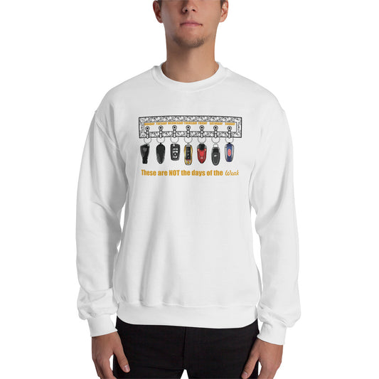 Man wearing a white crew neck sweatshirt with car keys design and the text "These are NOT the days of the Weak"