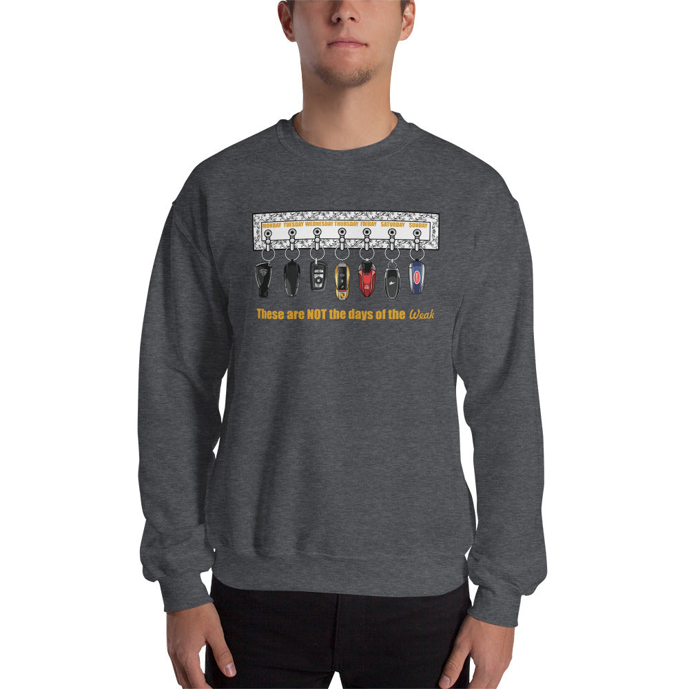 Man wearing a dark gray crew neck sweatshirt with car keys design and the text "These are NOT the days of the Weak"