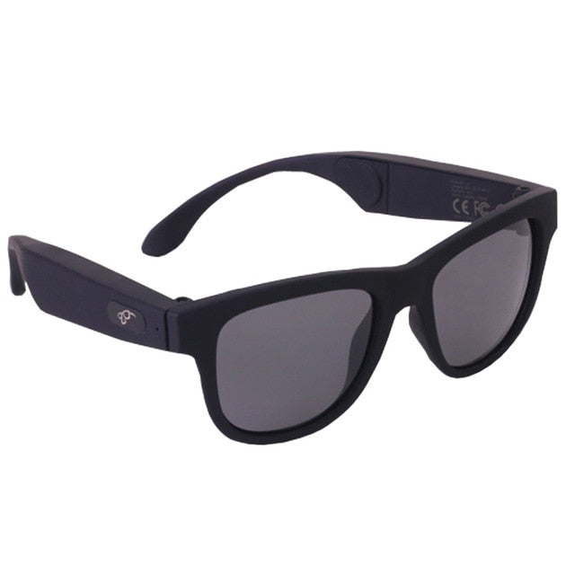 Black smart sunglasses with black tints on the lenses and wireless technology for calls