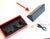 Black smart sunglasses with wireless technology for calls on a box and a fold up case